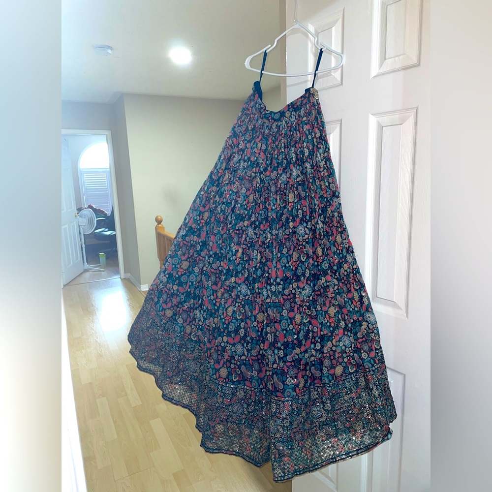 It is a  Indian lehnga with huge flare and cane, comes with a blouse and scarf